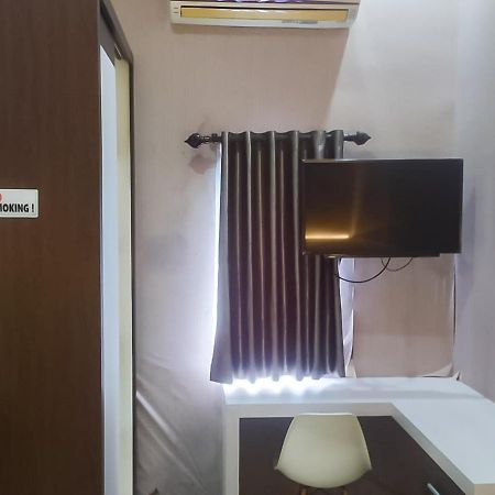 Hotel Reddoorz Syariah Near Sultan Syarif Kasim II Airport Pekanbaru Exterior foto