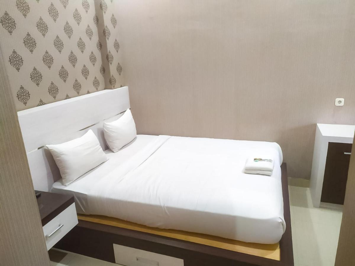 Hotel Reddoorz Syariah Near Sultan Syarif Kasim II Airport Pekanbaru Exterior foto