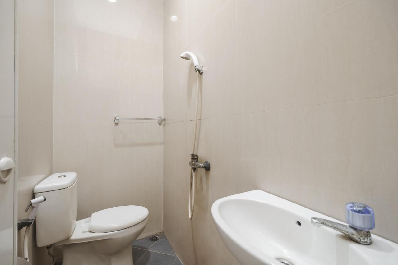 Hotel Reddoorz Syariah Near Sultan Syarif Kasim II Airport Pekanbaru Exterior foto